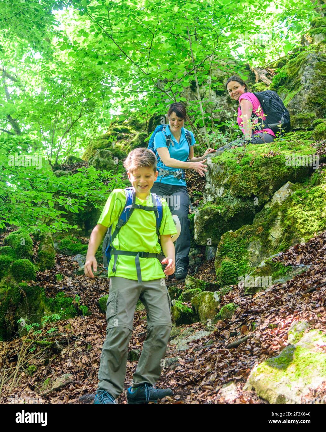 Good Humoured Young People Hiking On Rocky Trail In Franconian Hills Stock Photo Alamy