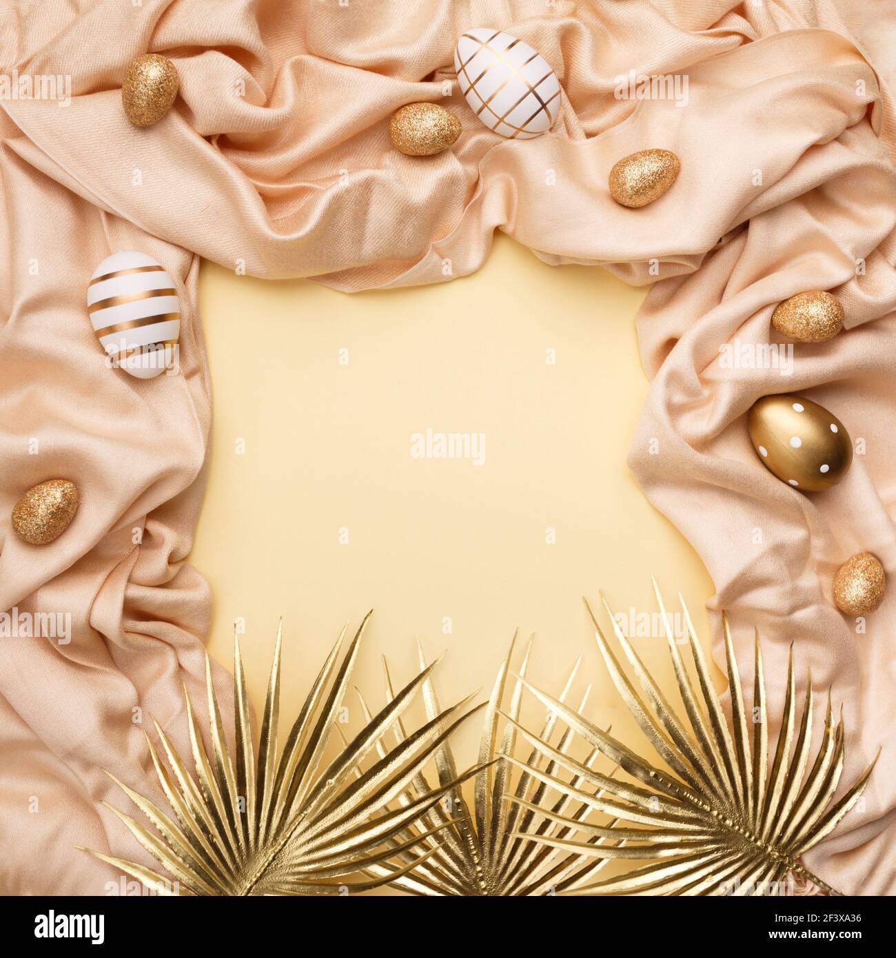Minimal Concept Palm Leaves With A Golden Easter Eggs On A Silk Or Saten Fabric Against Pastel Background With Copy Space Stock Photo Alamy