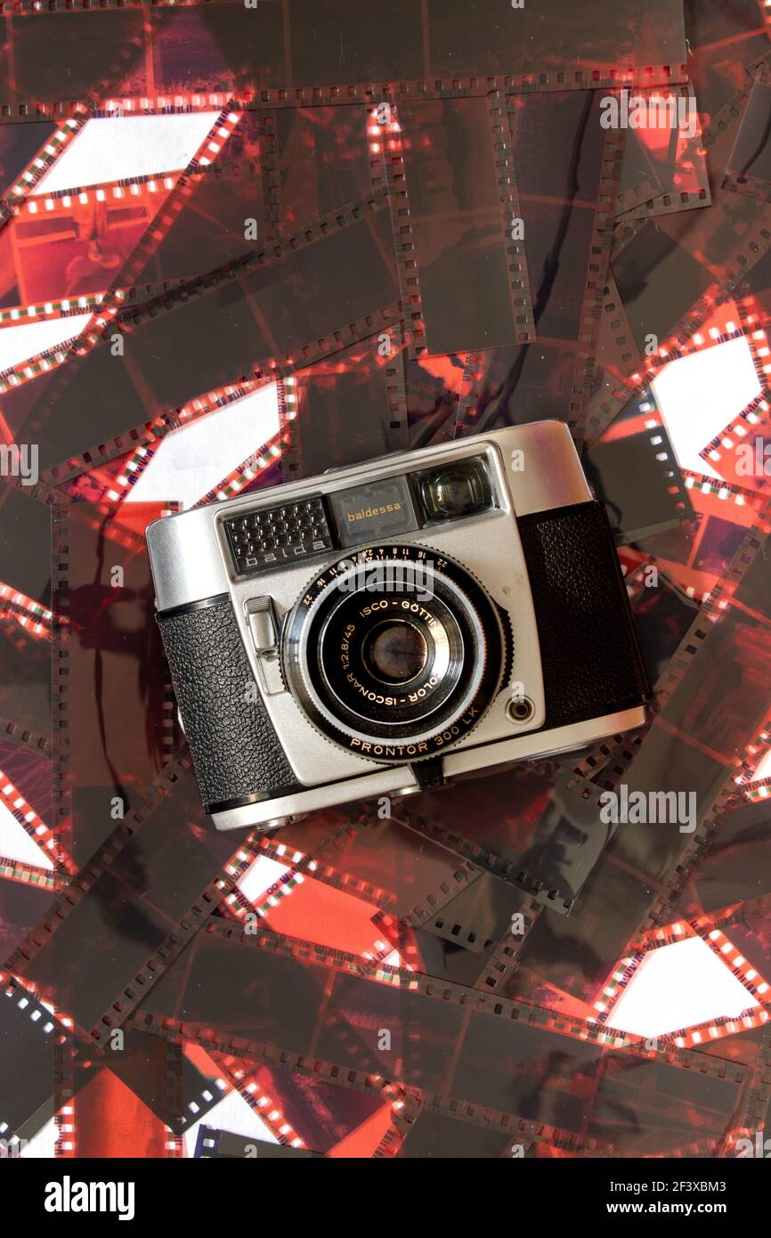 vintage analog camera on film photography background Stock Photo