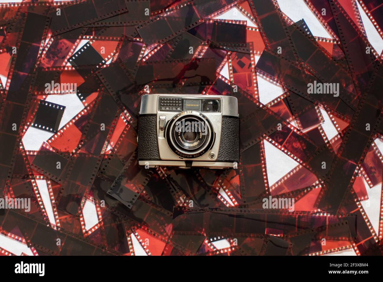 vintage analog camera on film photography background Stock Photo