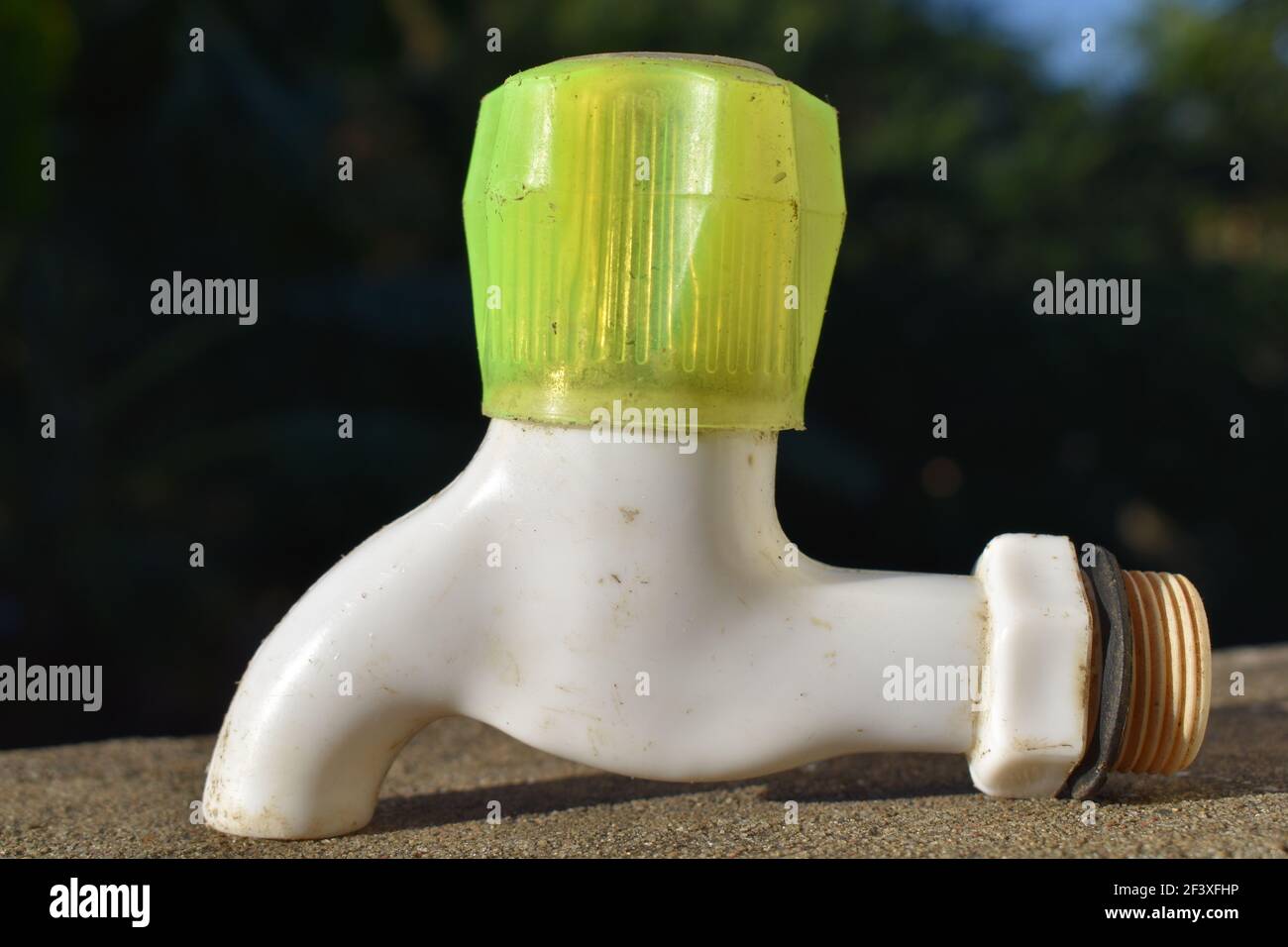 White and yellow water tap. Plumbing work parts Stock Photo Alamy