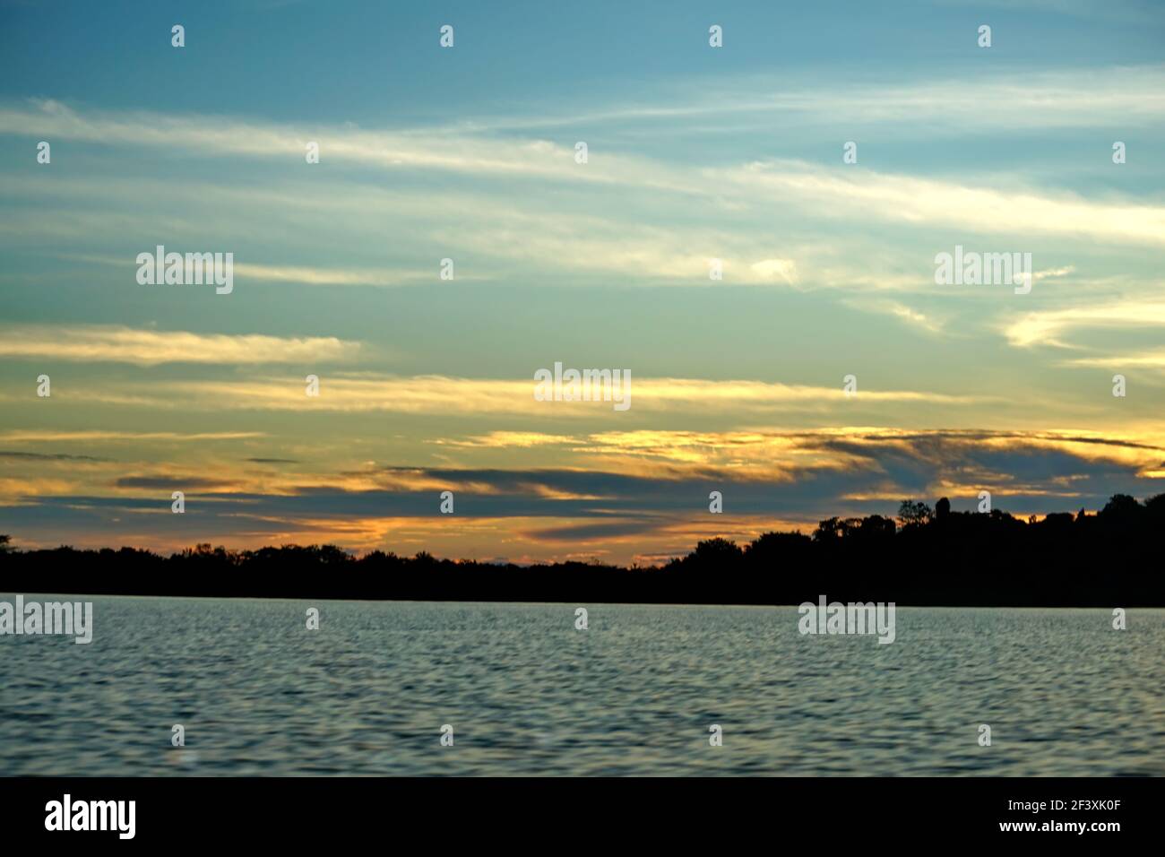 Sunset over Laguna Grande in the Cuyabeno Wildlife Reserve outside of ...