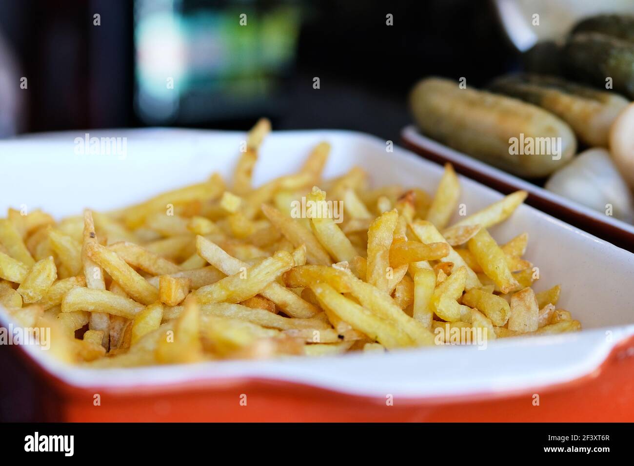 French fries in street side restaurant. Street food and outdoor cooking