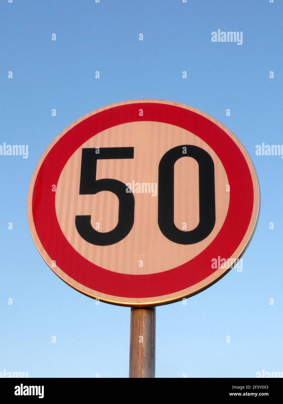 A speed limit traffic sign indicating 50km/h Stock Photo - Alamy