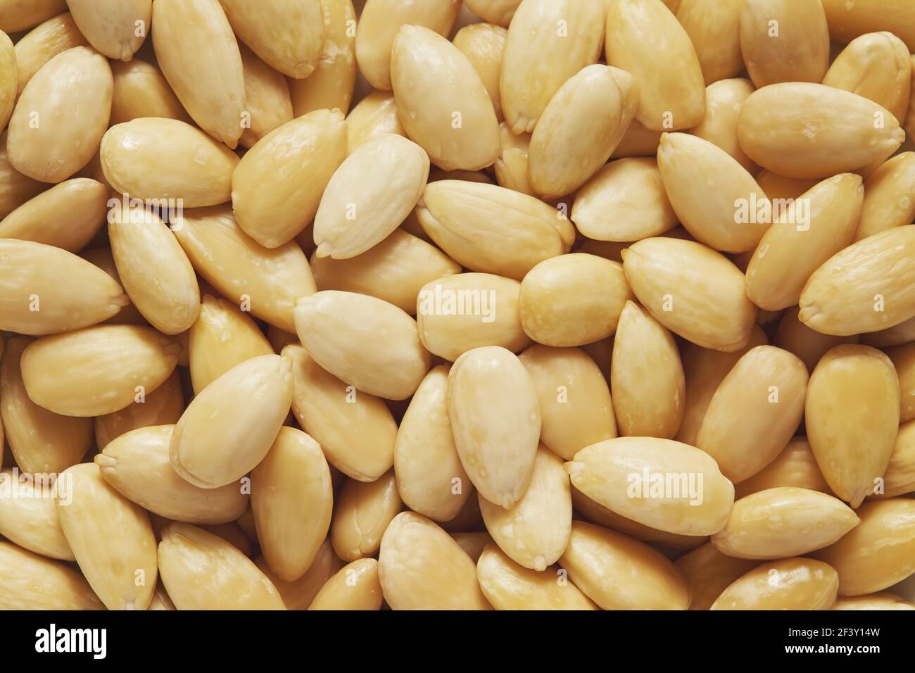 Whole Blanched Almonds Background Stock Photo Alamy