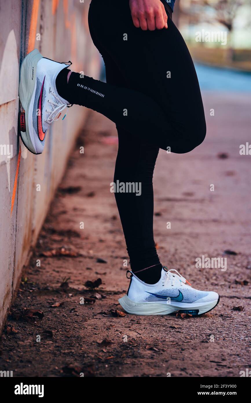 TOKYO, JAPAN, MARCH 18. 2021: Nike running shoes ALPHAFLY NEXT%.  Controversial athletics shoe on legs of professional athlete running on the  road. Off Stock Photo - Alamy