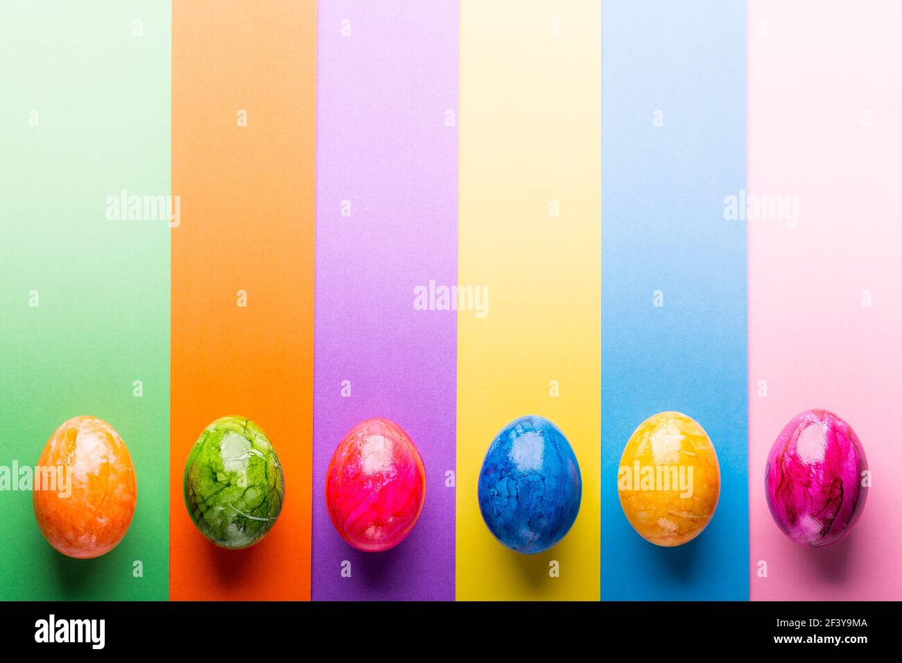 Multicolor geometric background with easter eggs. Stock Photo