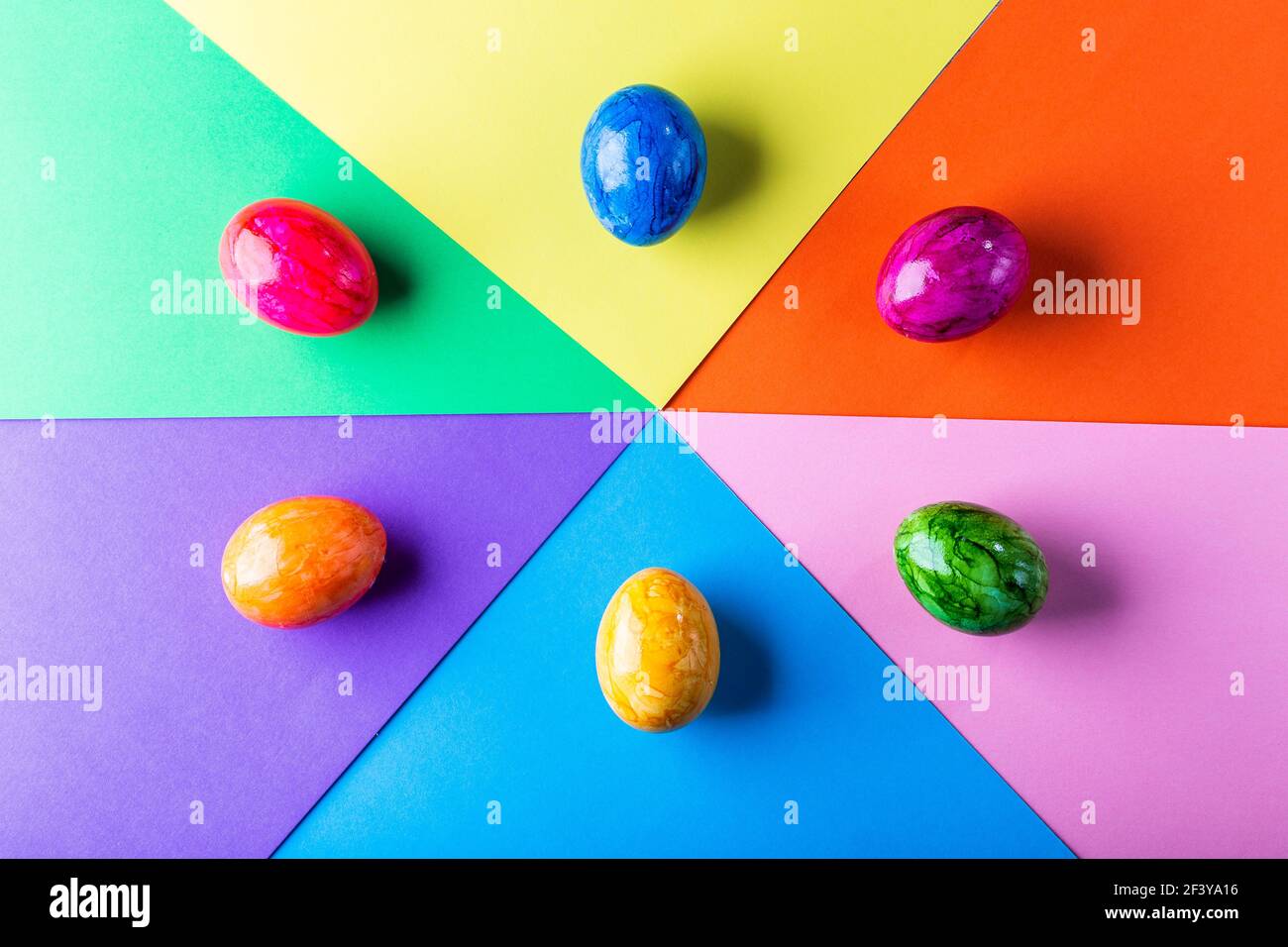 Multicolor geometric background with easter eggs. Stock Photo