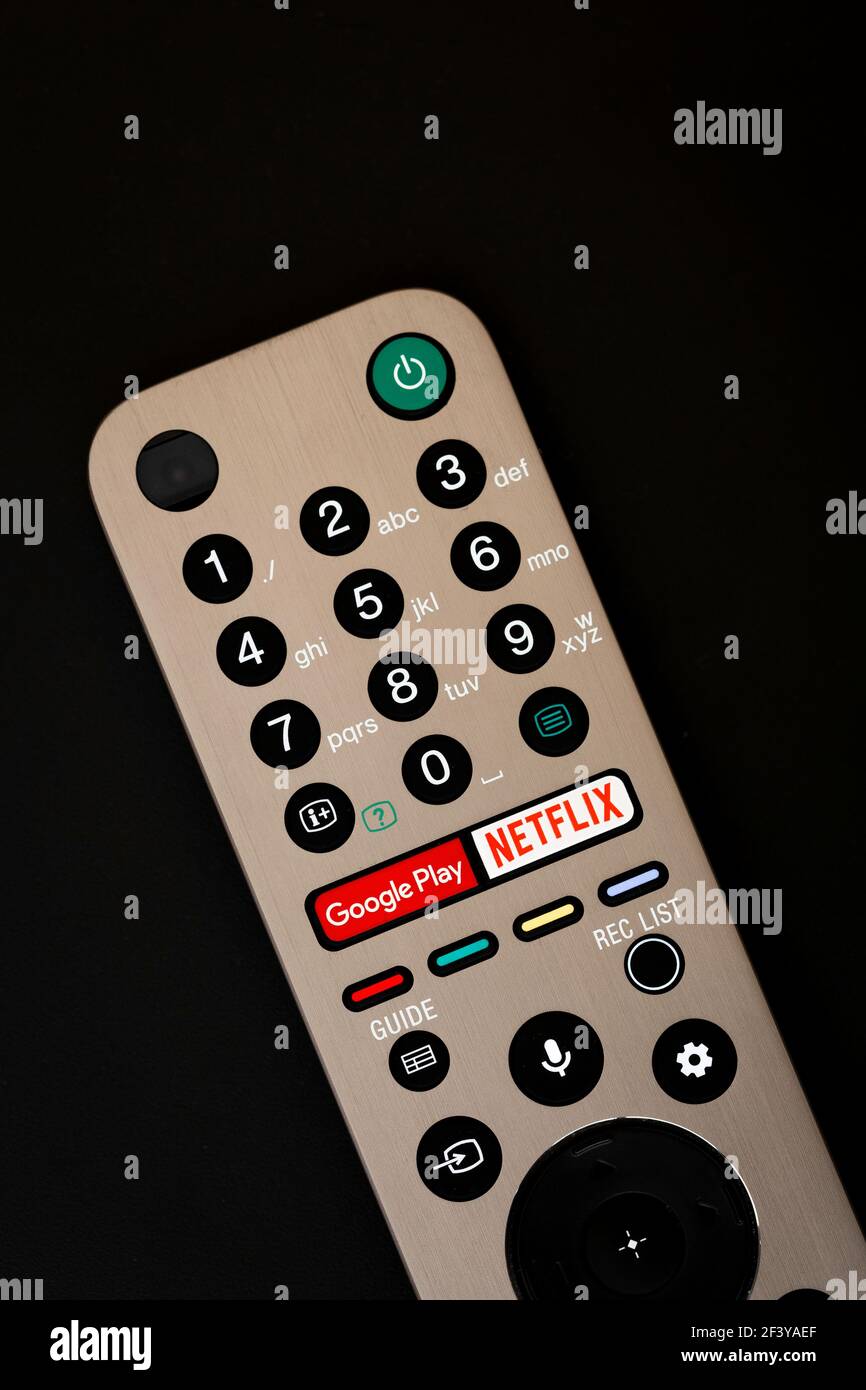 Warsaw, Poland, January 29, 2021: Remote controler with Netflix and Google play buttons. Stock Photo