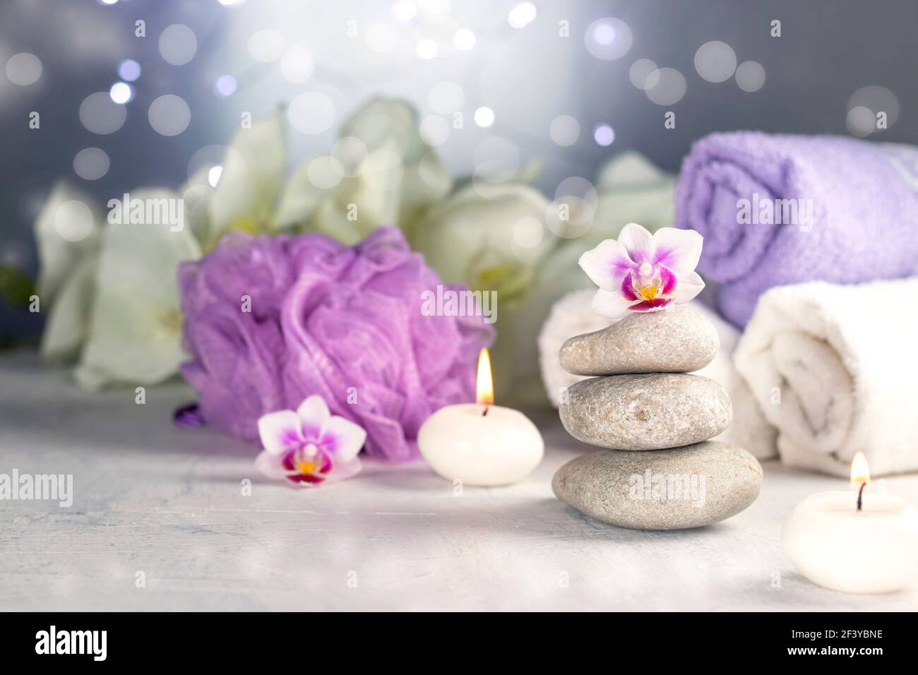 Massage Stones Burning Candles Rolled Towels Flowers Abstract Lights Spa Resort Therapy