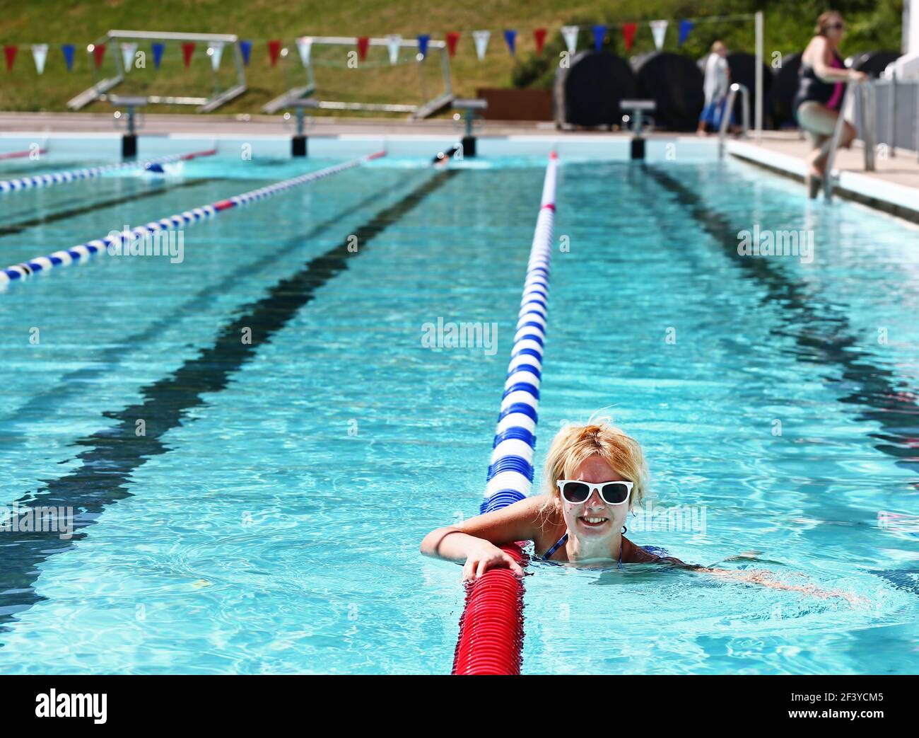 Swimmer in the outdoor pool Tinnerbäcksbadet, Tinnis, in central ...