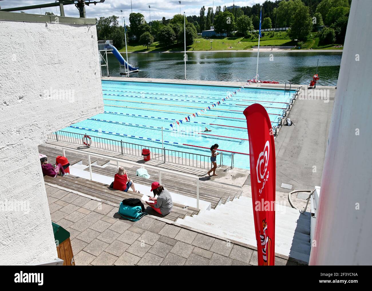 Swimmer in the outdoor pool Tinnerbäcksbadet, Tinnis, in central ...