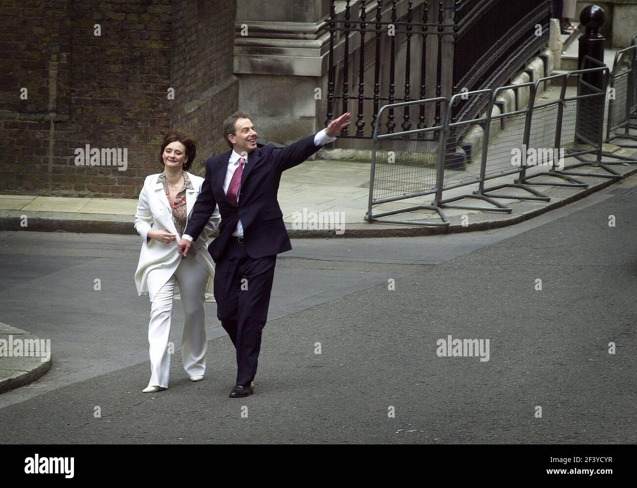 THE VICTORIOUS TONY BLAIR AND WIFE CHERIE BALIR WALK ALONG DOWNING ST