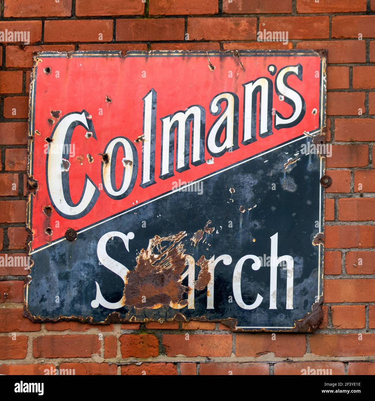 Close up of Vintage old advert enamel advertising sign for Colmans Starch England UK Stock Photo