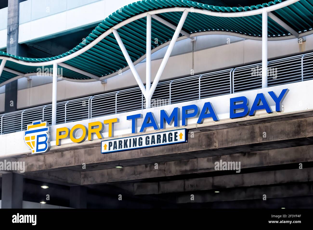 Tampa, USA - April 27, 2018: Port of Tampa bay in downtown Florida city with sign for parking lot garage at commercial cargo shipping and cruise termi Stock Photo