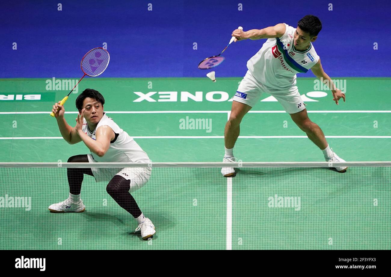Japan's Akira Koga (left) and Taichi Saito in action during their match against Japan's Keigo Sonoda and Takeshi Kamura on day two of the YONEX All England Open Badminton Championships at Utilita Arena Birmingham. Picture date: Thursday March 18, 2021. Stock Photo