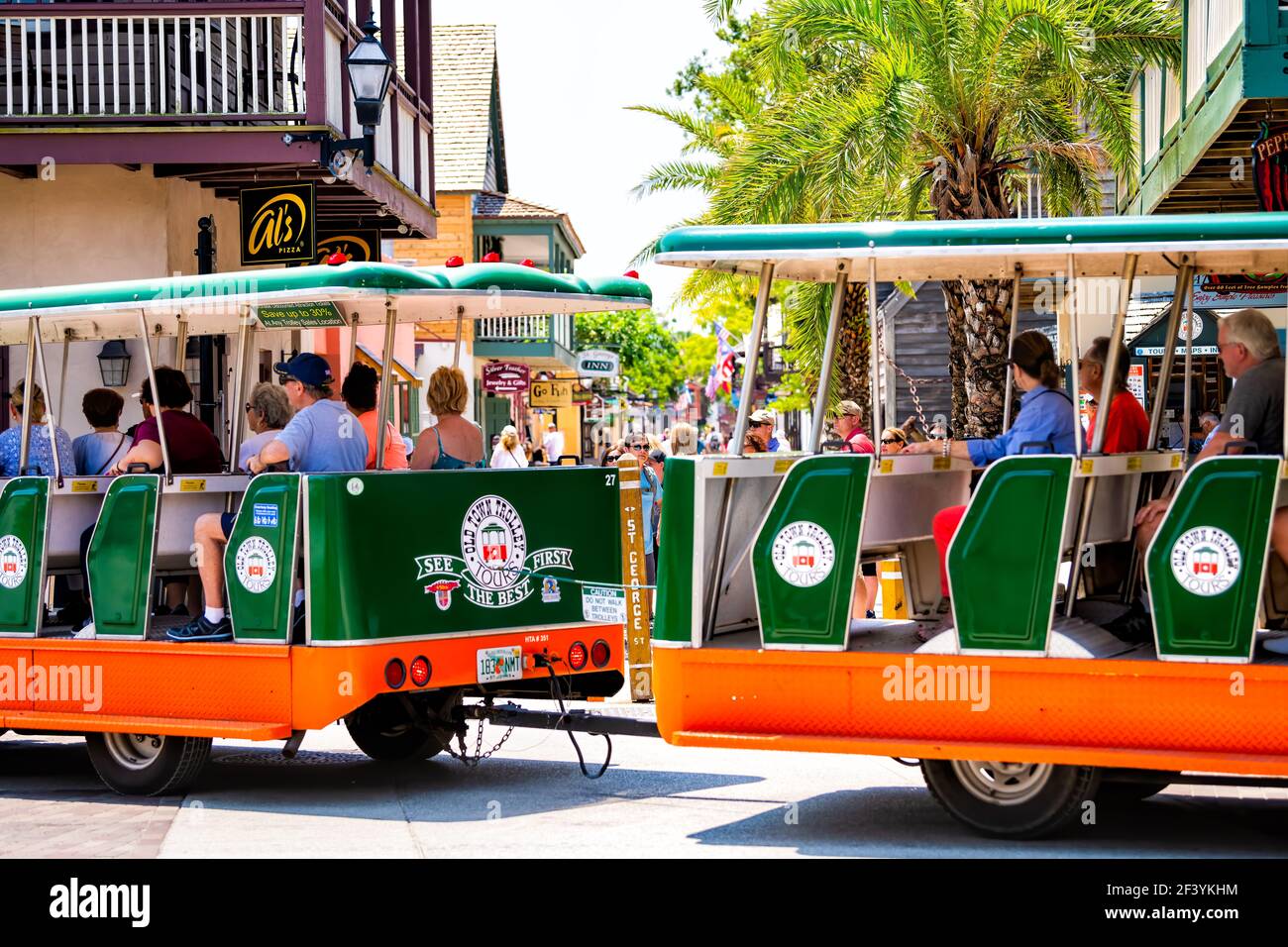 St. Augustine, USA - May 10, 2018: People riding at old town Florida Colonial quarter on tour guide bus trolley in historic city on summer sunny hot d Stock Photo