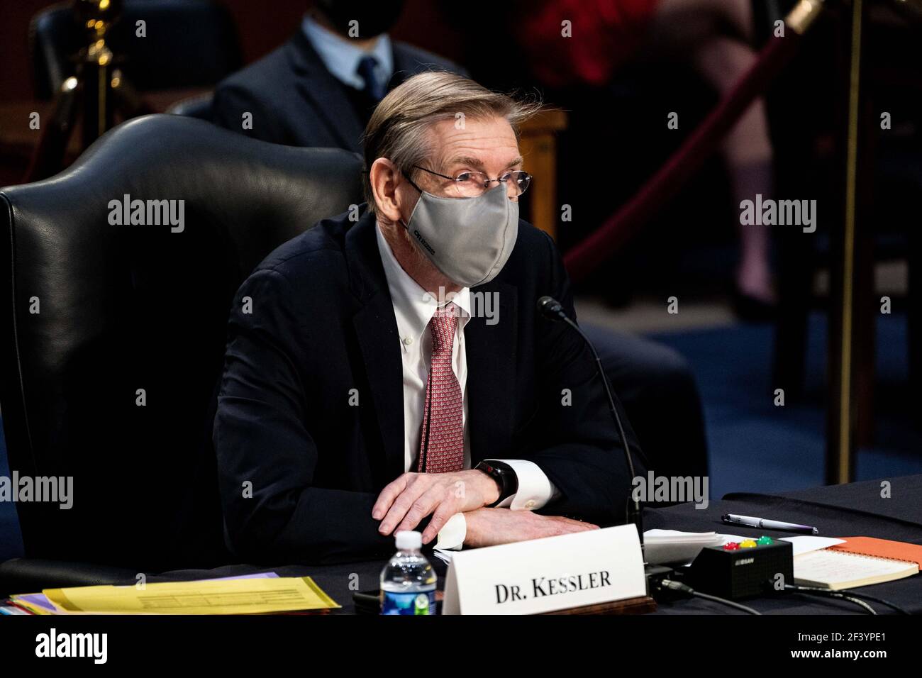 Washington, United States. 18th Mar, 2021. Dr. David Kessler, Chief Science Officer of the White House COVID-19 Response Team, listens at a hearing with the Senate Committee on Health, Education, Labor, and Pensions on the Covid-19 response on Capitol Hill in Washington March 18th, 2021. Pool Photo by Anna Moneymaker Credit: UPI/Alamy Live News Stock Photo