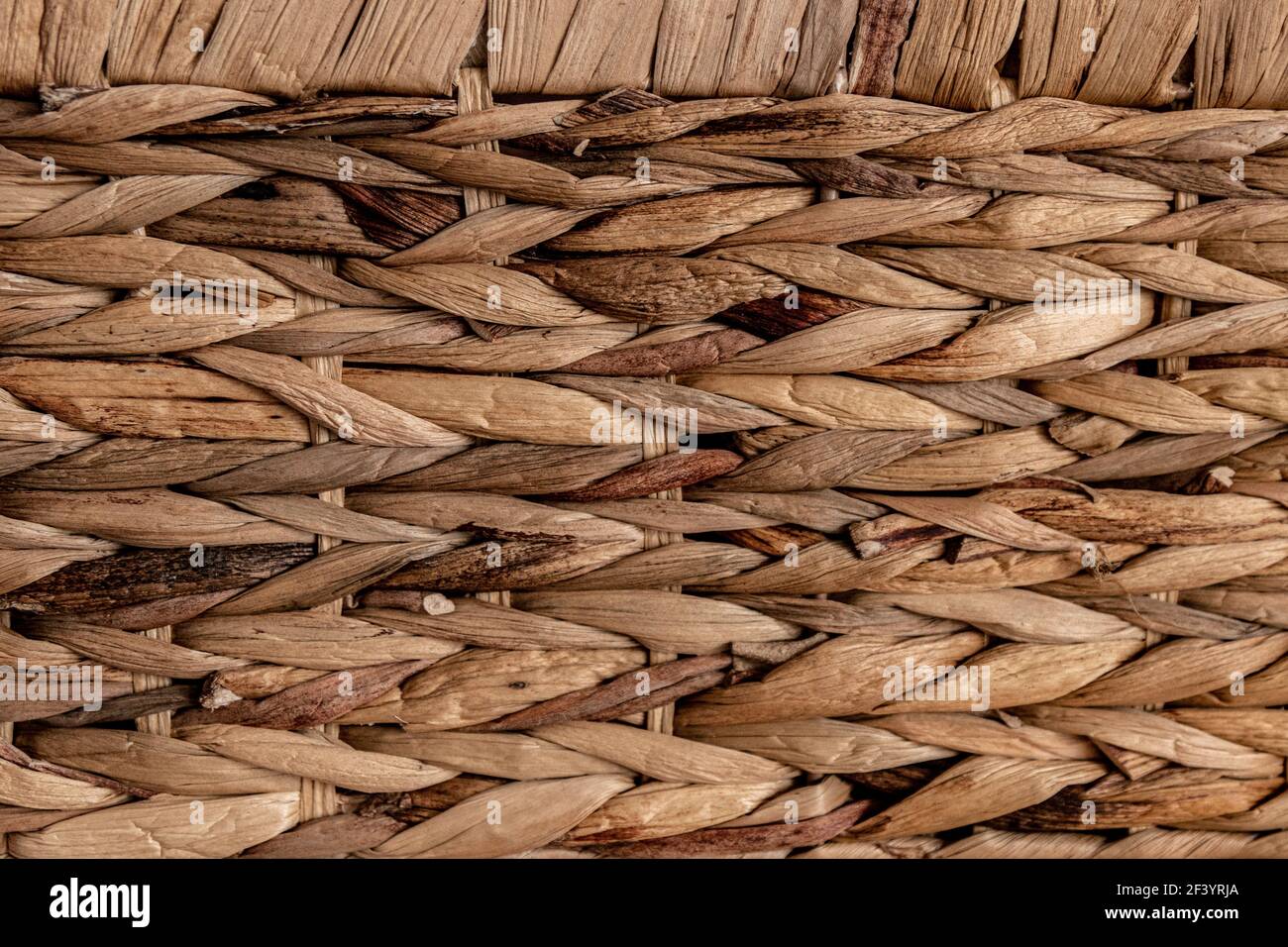 Rough burlap, jute texture. Handmade Wicker placemat textured backdrop