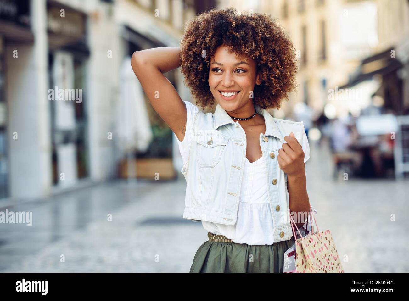 Black woman shopping in high heels hi-res stock photography and images -  Alamy