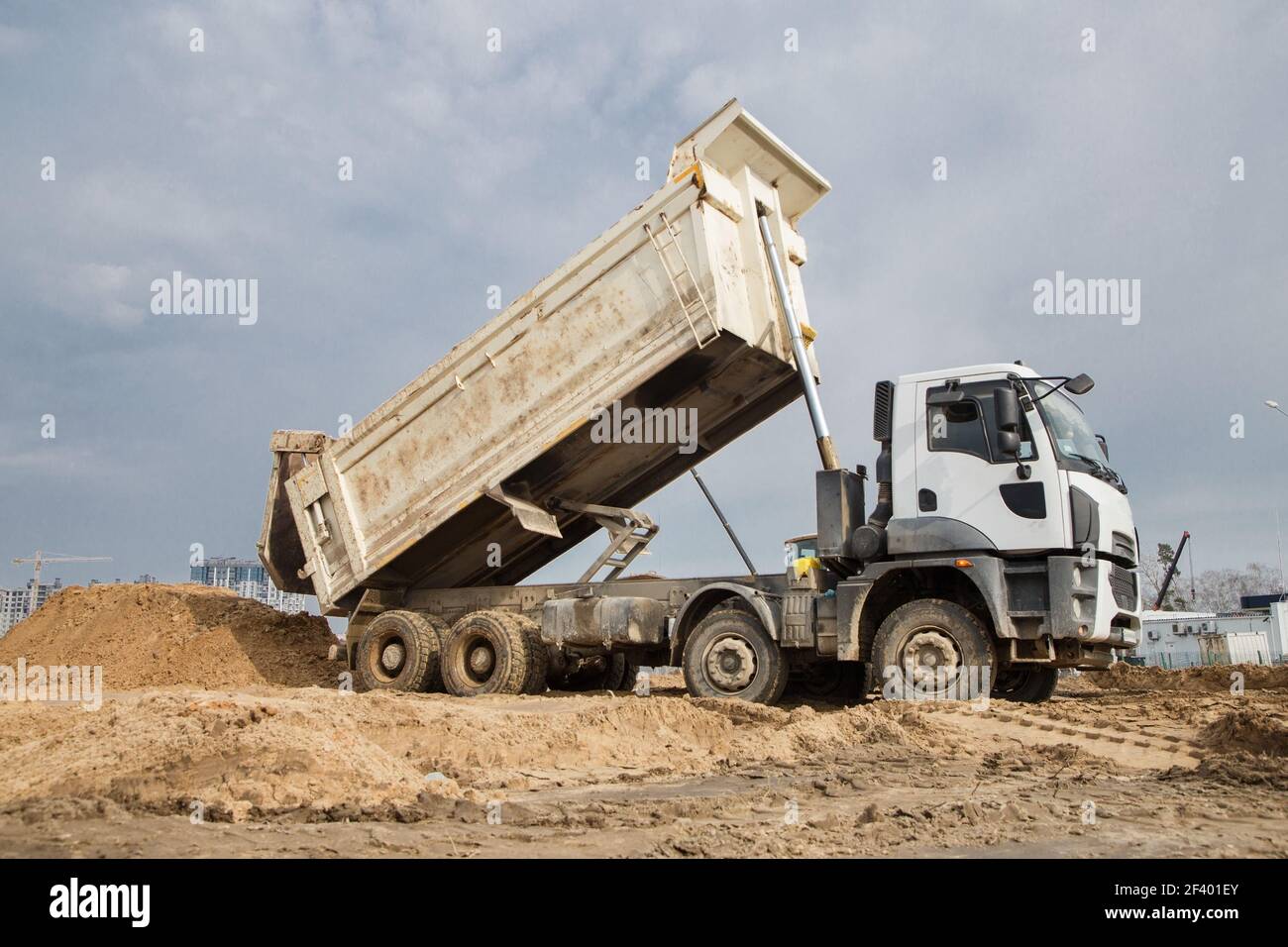 dump-truck-at-work-on-a-construction-site-the-process-of-transporting