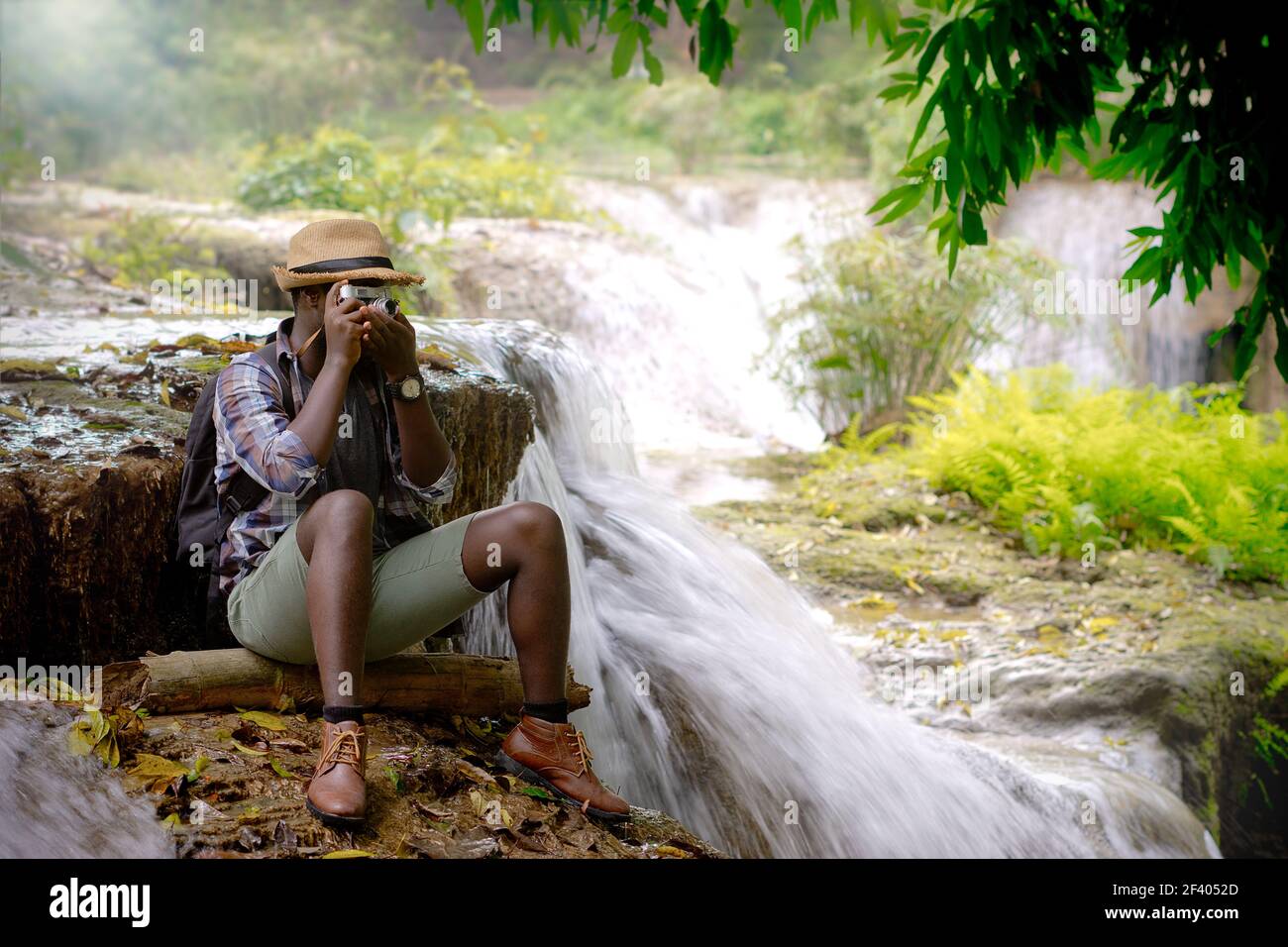 African traveler man sitting hi-res stock photography and images - Alamy