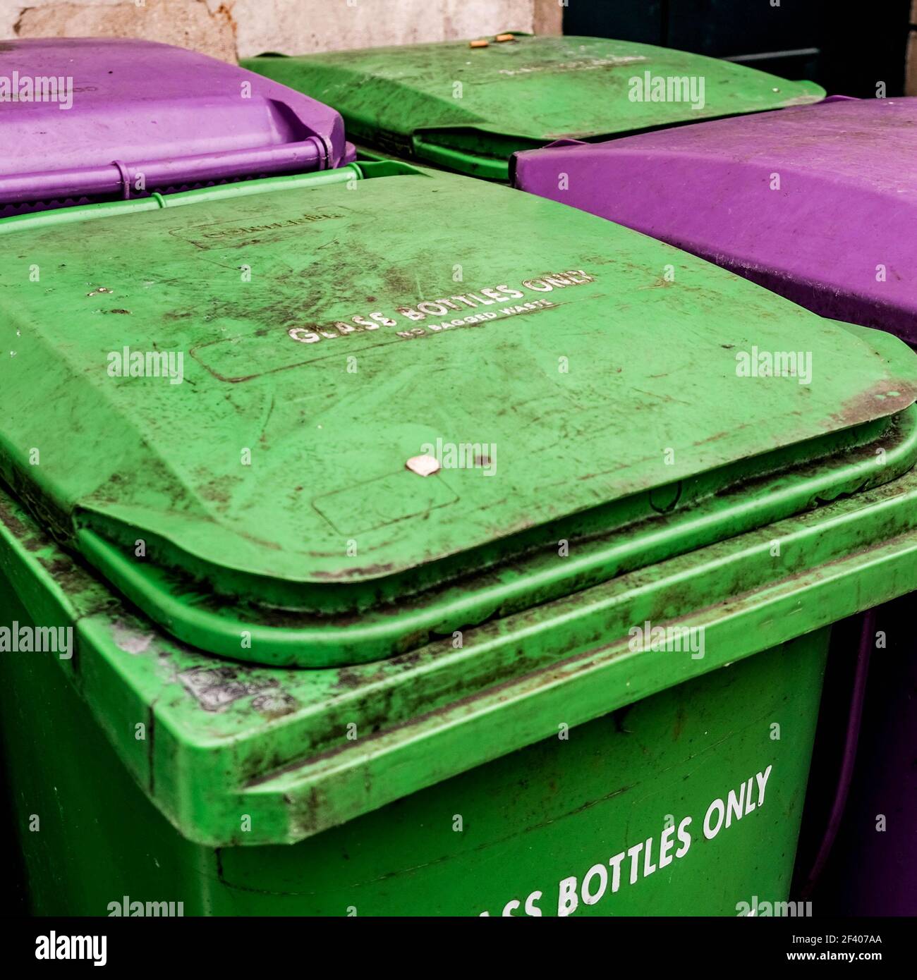 London UK, March 18 2021, Green and Purple Council Rubbish Wheelie Bins