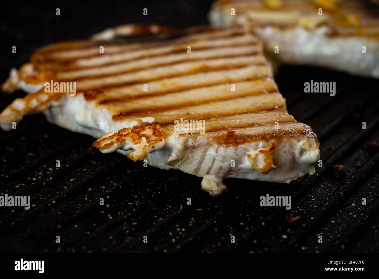 Pork steaks cooking on the grill. Food for humans. Pork animal in steak