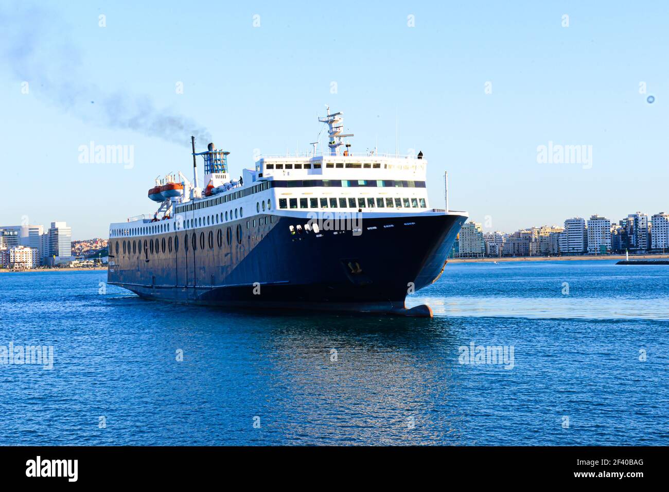 A ship bound from Tangiers, Morocco to Spain, to transport passengers. Travel wallpaper Stock