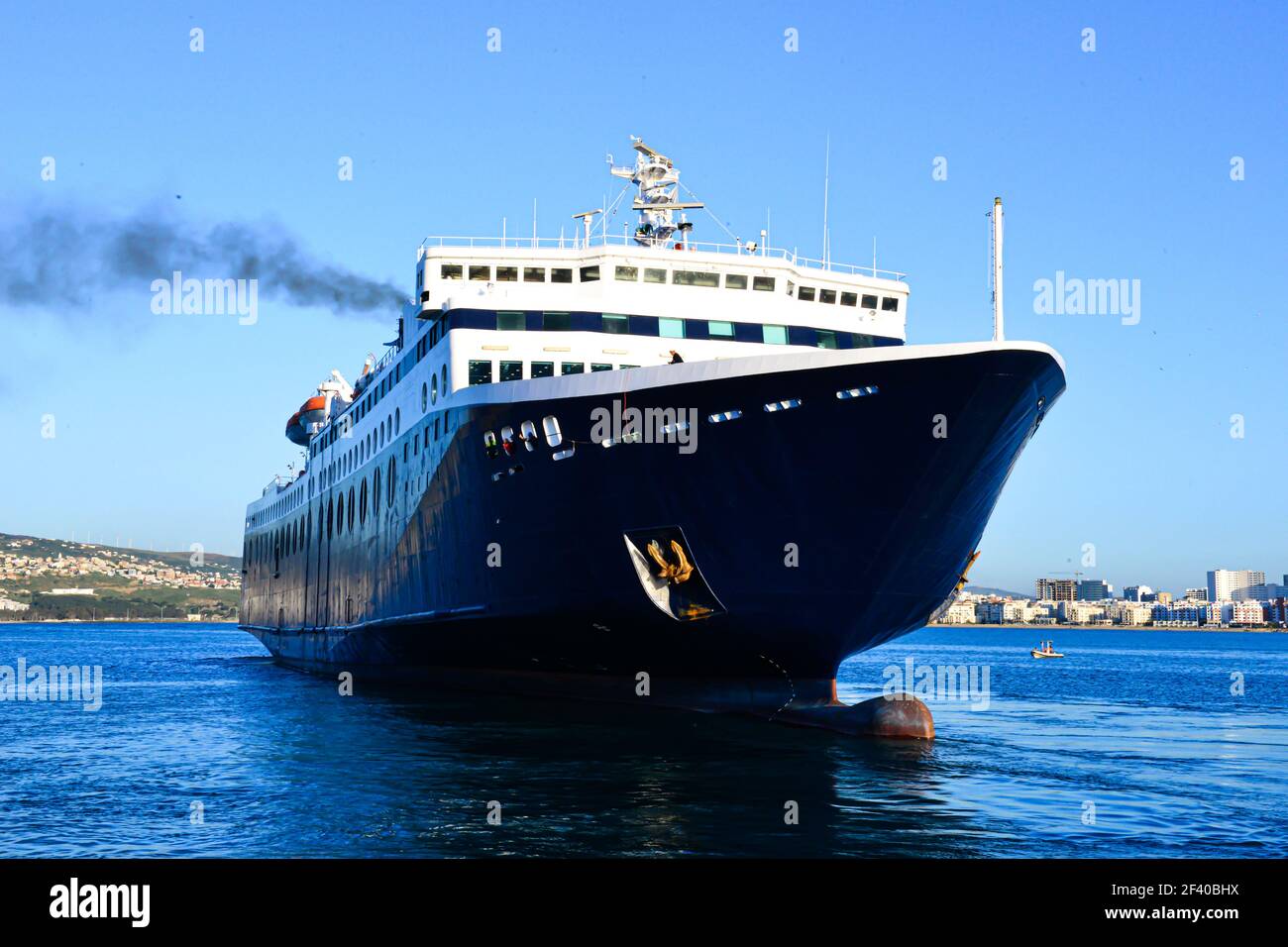 A ship bound from Tangiers, Morocco to Spain, to transport passengers. Travel wallpaper Stock