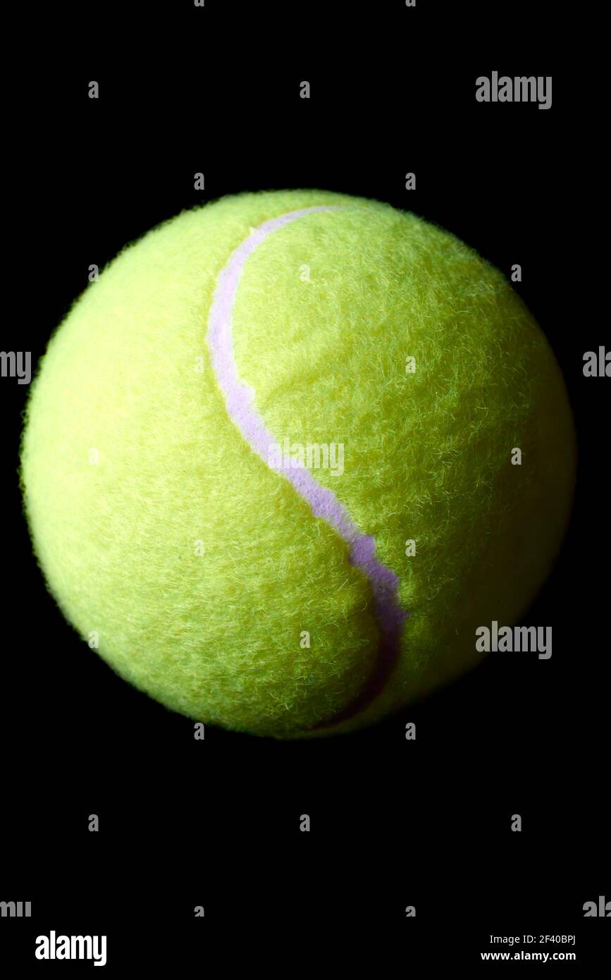 Close Up Of Green Tennis Ball On Black Background Stock Photo Alamy close-up-of-green-tennis-ball-on-black-background-stock-photo-alamy