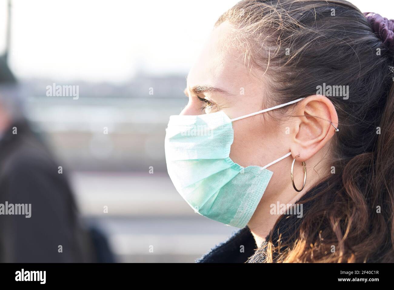 Female face profile wearing mask hi-res stock photography and images ...
