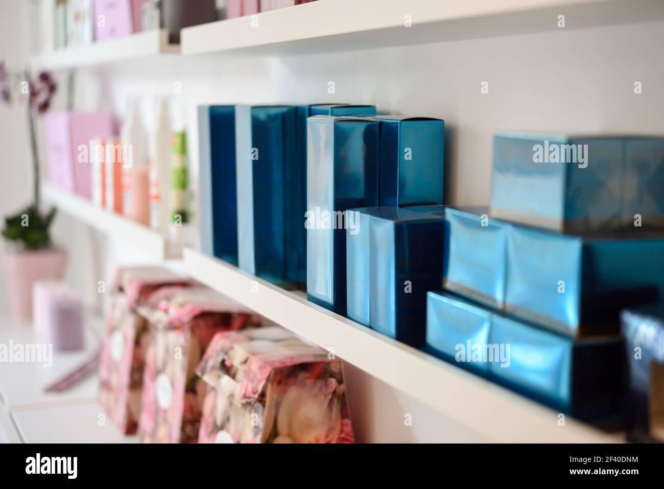Cosmetic section with facial cream, conditioners, shampoo and hair treatment in store Stock Photo