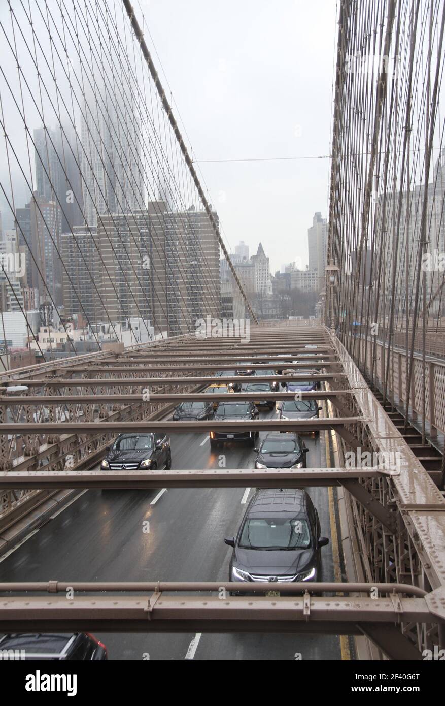 New York, USA. 18th Mar, 2021. (NEW) Heavy movement of trafficking in New York. March 18, 2021, New York, USA: There is a heavy traffic movement of vehicles around Brooklyn bridge in New York and with the rainfall, slowing down the flow .Credit: Niyi Fote /Thenews2. Credit: Niyi Fote/TheNEWS2/ZUMA Wire/Alamy Live News Stock Photo