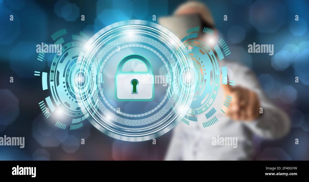 Man with vr headset touching a data security concept on a touch screen with his finger Stock Photo