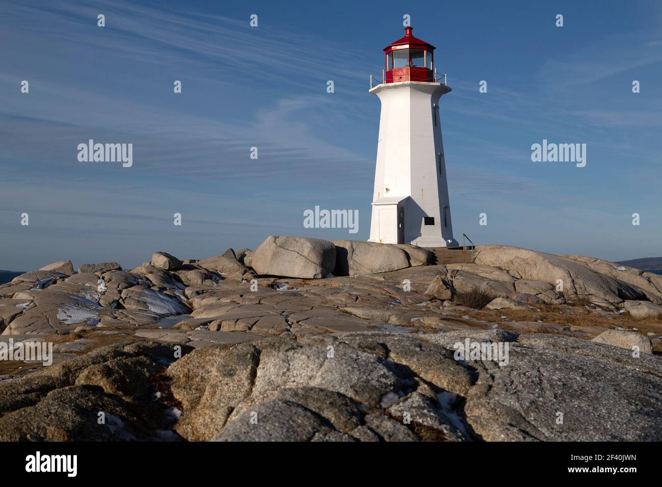peggys-point-lighthouse-standing-on-rocks-at-peggy-s-cove-in-nova