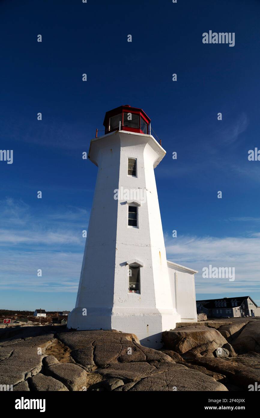 Peggys Point Lighthouse at Peggy's Cove in Nova Scotia, Canada. The octagonal lighthouse was built in 1914. Stock Photo