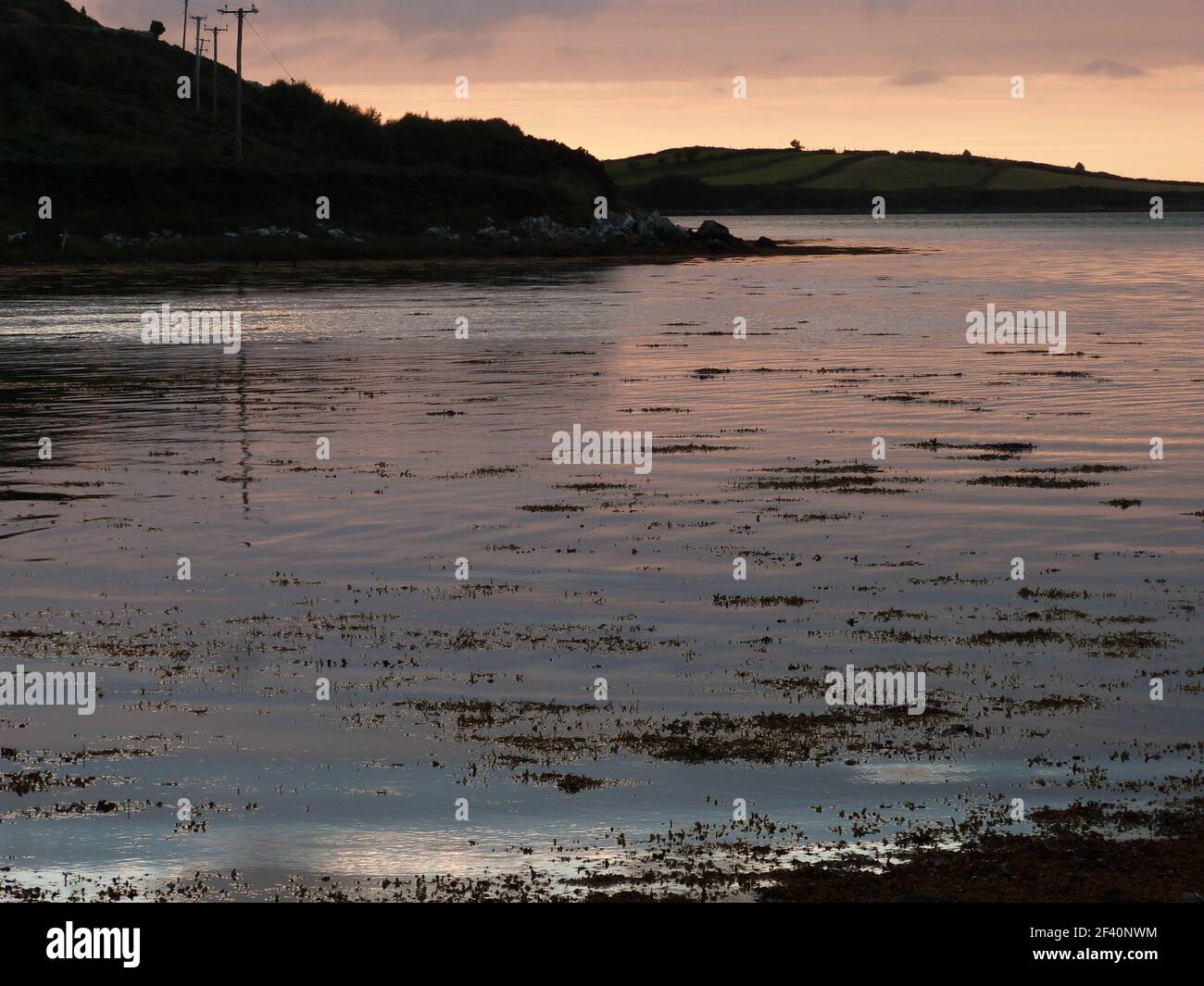 amazing sunset above the ocean in ireland Stock Photo Alamy