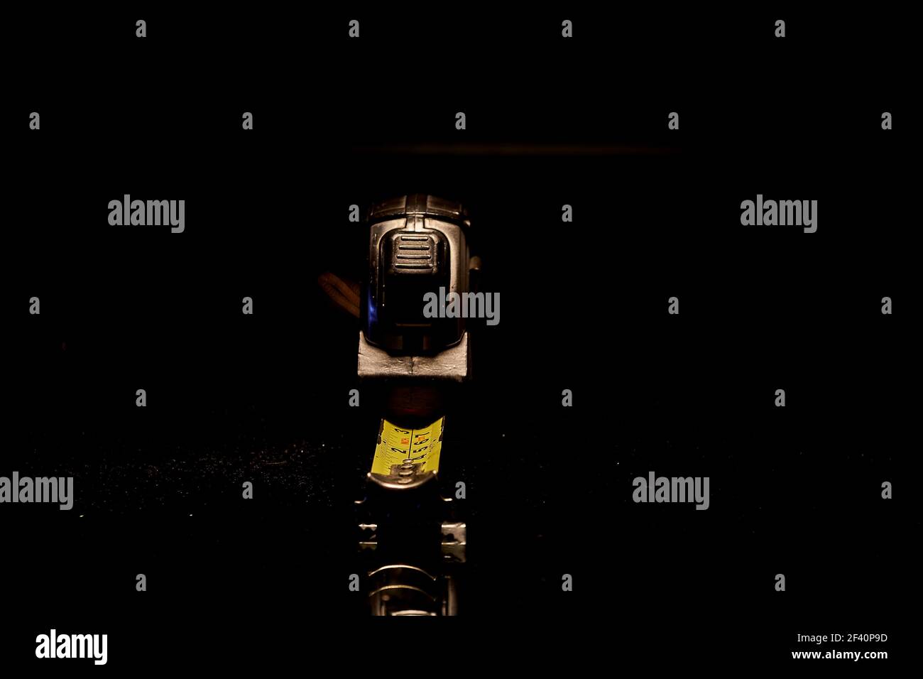 Yellow meter against black background Stock Photo - Alamy