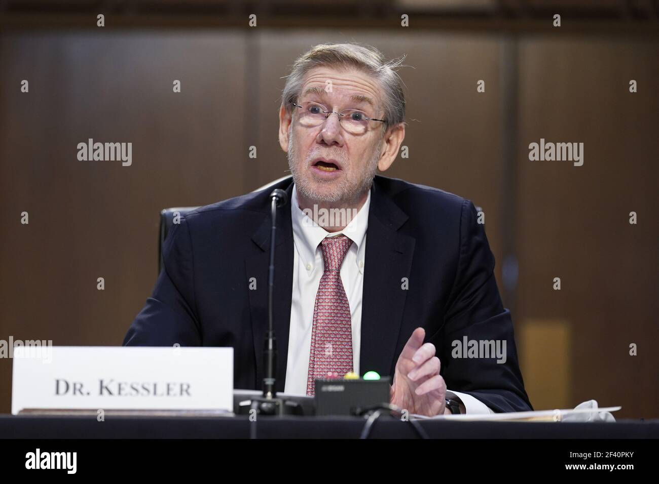 Washington, United States. 18th Mar, 2021. Dr. David Kessler, Chief Science Officer of the White House COVID-19 response team, testifies during a Senate Health, Education, Labor and Pensions Committee hearing on the federal coronavirus response on Capitol Hill in Washington March 18th, 2021. Pool Photo by Susan Walsh/UPI Credit: UPI/Alamy Live News Stock Photo