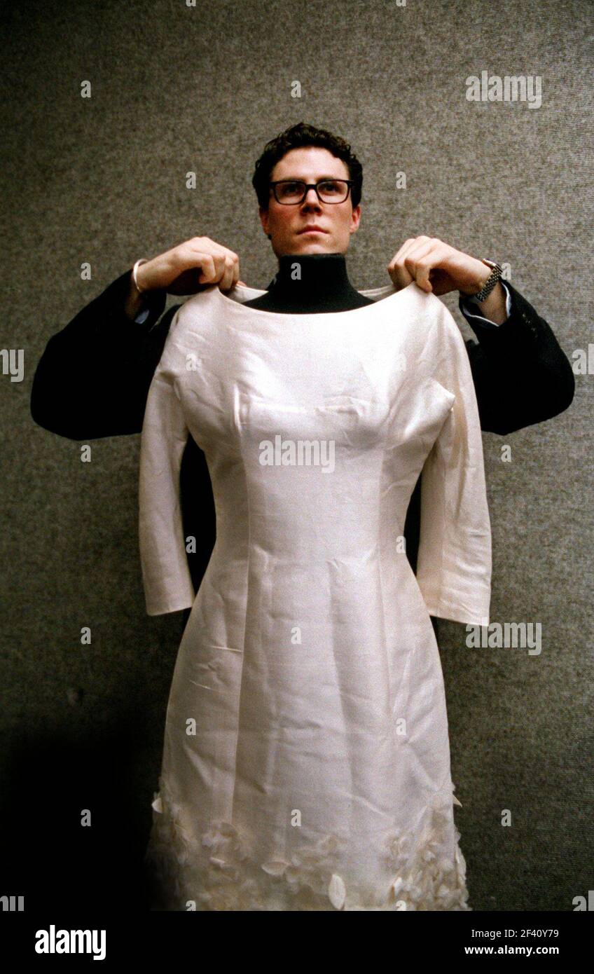 Wedding dress of actress Britt Ekland being prepared for sale in London by Andrew Reilly of Christies Stock Photo