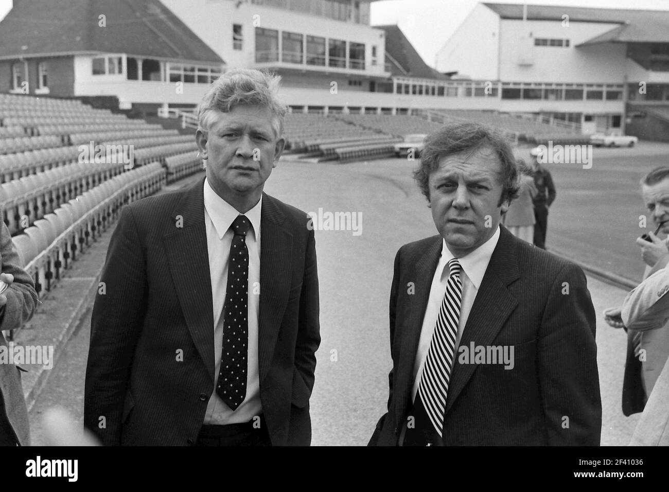 Geoff Boycott and Ray Illingworth discuss the future Yorkshire County Cricket club at Headingley in Sept 1981 in a press scrum Stock Photo