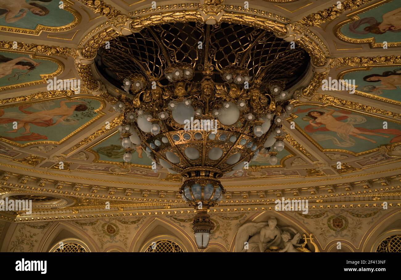 Golden gothic style ceiling chandelier in opera house in L'viv city in Ukraine Stock Photo