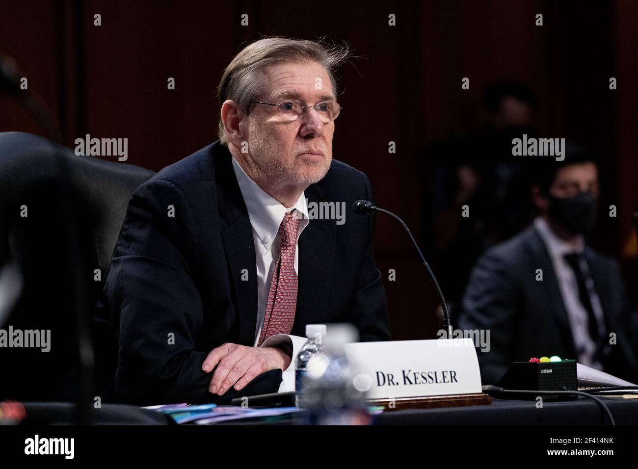 Washington, USA. 18th Mar, 2021. Dr. David Kessler, Chief Science Officer of the White House COVID-19 Response Team, listens during a hearing, with the Senate Committee on Health, Education, Labor, and Pensions, on the Covid-19 response, on Capitol Hill in Washington March 18th, 2021. (Photo by Anna Moneymaker/Pool/Sipa USA) Credit: Sipa USA/Alamy Live News Stock Photo