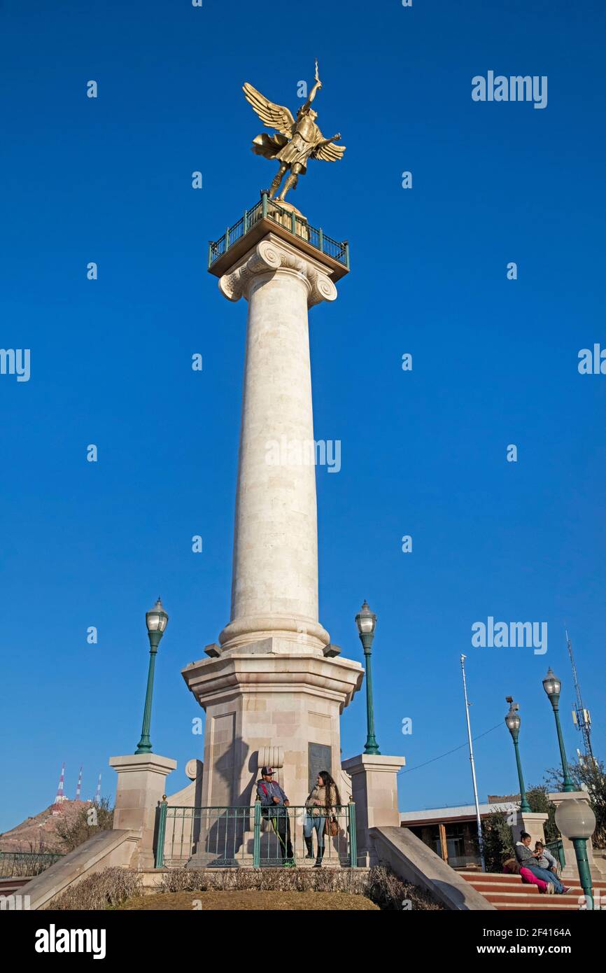 Marble column with Angel of Liberty / Angel de La Libertad on the Plaza Mayor in the city centre of Chihuahua, northwestern Mexico Stock Photo