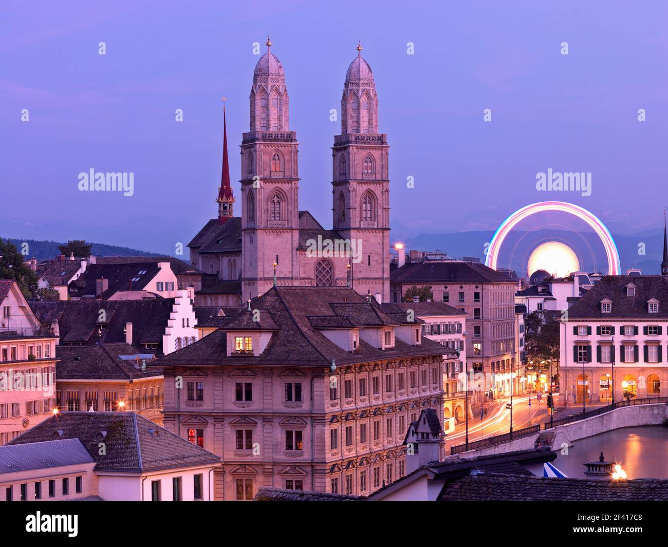 Old Town, Zurich with Grossmunster Church at dusk Stock Photo - Alamy