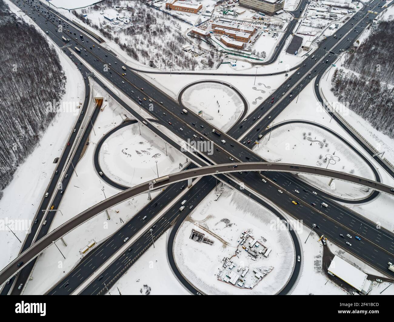 Aerial view of a freeway intersection Snow-covered in winter. Stock Photo