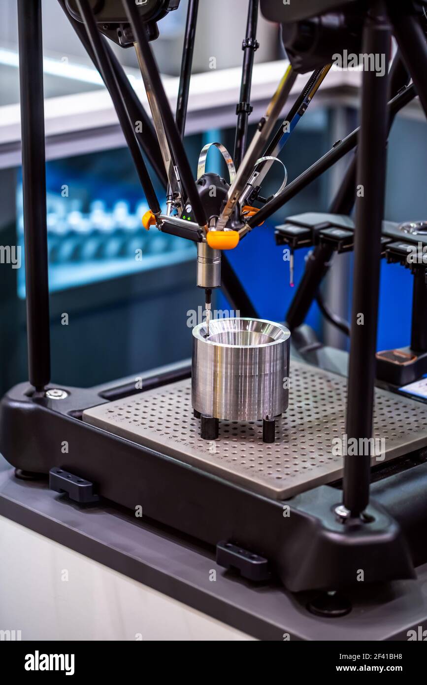 Quality control measurement probe. Metalworking CNC milling machine. Cutting metal modern processing technology. Small depth of field. Warning - authentic shooting in challenging conditions. Stock Photo
