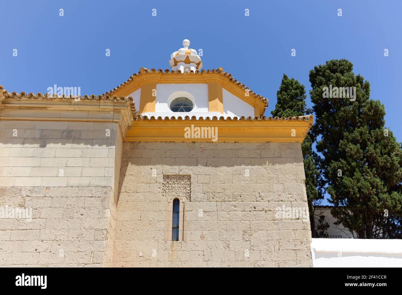 A low-angle shot of the white building of La Rabida Monastery in Huelva ...