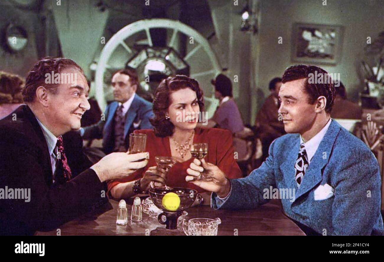 A SPORTING CHANCE 1945 Republic Pictures film with  from left: Edward Gargan, Jane Randolph and Steve Barclay Stock Photo